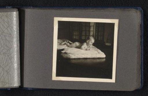Norbert Peter van den Berg as a baby, lying on his stomach on a rug
