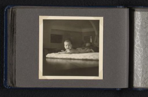 Norbert Peter van den Berg as a baby, lying on his stomach on a rug