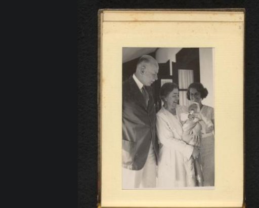 Man, two women and a baby