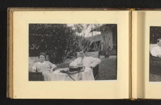 Woman and man at a table in a garden
