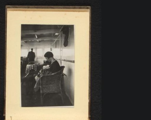 Seated woman on board a ship