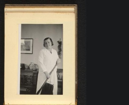 Woman with a vacuum cleaner