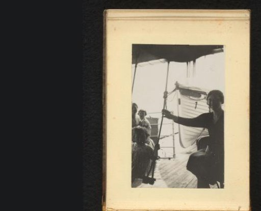Woman and child by a ship