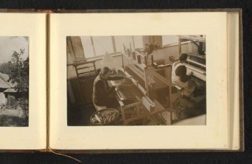 Two working women behind looms