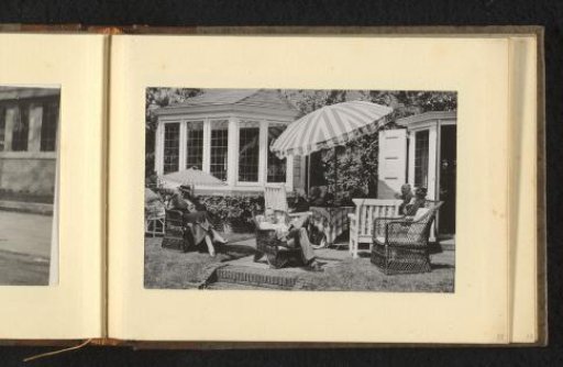 People on a terrace in a garden