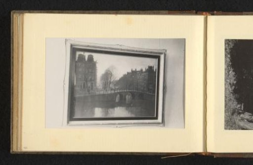 Painting in a Frame with a View of a Canal