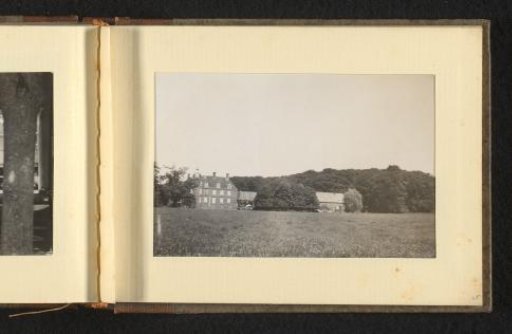 View of a country house in a meadow landscape