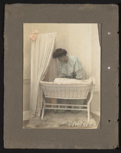 Caroline Louise van den Berg next to son Carel (Cay) in the cradle