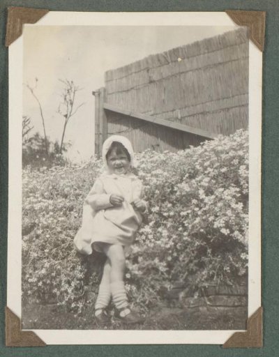 Four photographs of children of the Onnen-Van den Berg family during a holiday