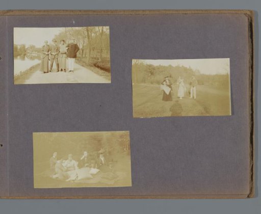 Friends and family of the Onnen-van den Berg household in a forest, with the photographer's shadow on the right