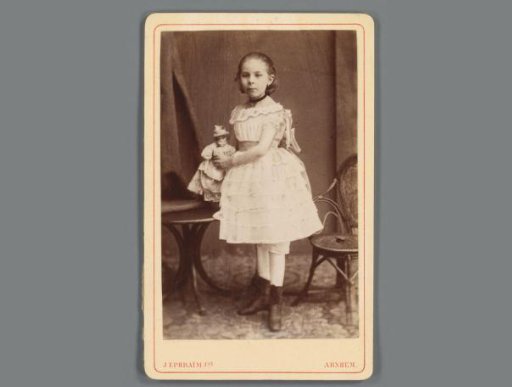 Portrait of an unknown girl with a doll from the family and the circle of Eugene van Delden and Belle van Delden-Denninghof Stelling