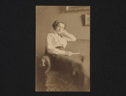 Portrait of Johanna (Hans) de Jong sitting on a bench