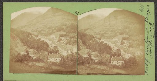 Village at the foot of a mountain; the Alps