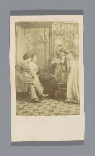 Group of three women and a man
