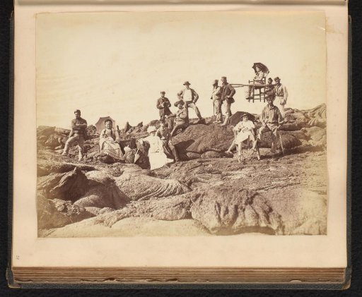 Group portrait of unknown men and women with sedan chairs, likely on the Vesuvius