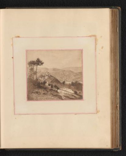 Landscape with hills and a town