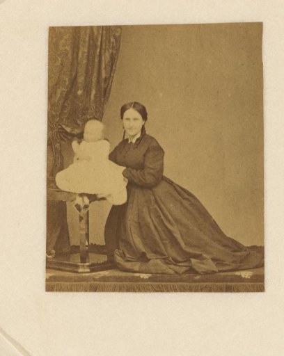 Portrait of a seated woman with a child