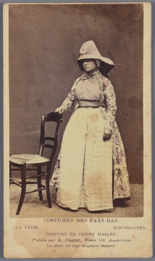 Portrait of an unknown woman in the costume of Hindeloopen