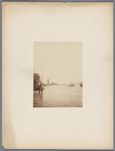 View Over the Water with Water Tower and Windmill
