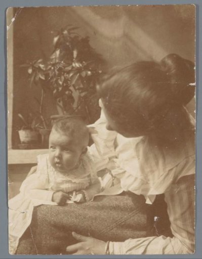 Portrait of a woman with a baby