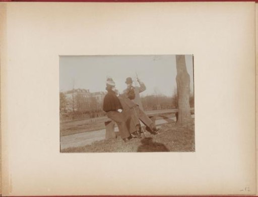 Young couple, the woman with a feathered hat, on a bench in a park, the man who was spying on her is struck by the other man with his walking stick, photo story 4