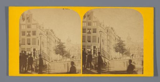 The Warmoesgracht in Amsterdam with passersby