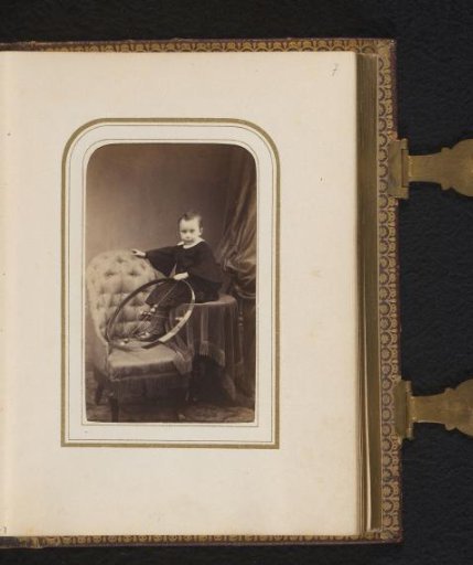 Portrait of an unknown child with toys