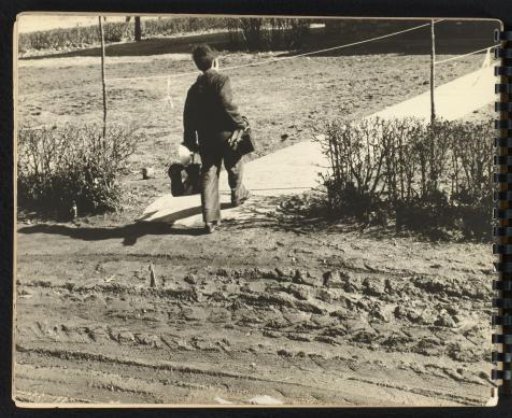 Boy with camera equipment (?)