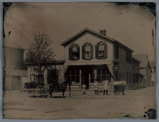 Group of people and a horse and carriage for a house or shop