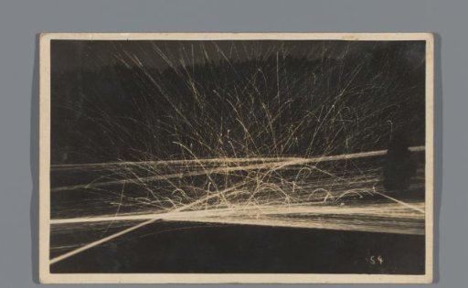 Barrage fire with machine guns at evening or night