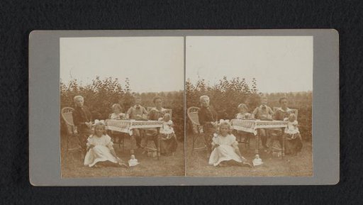 Portrait of Miss Vellekamp, Rie Suyver, Adriana Suyver; Hen Suyver, Alida Suyver-Schogt, with Jan Suyver on Her Lap, at a Table in a Garden