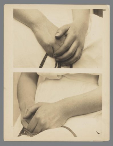 Hands in Lap with Cord