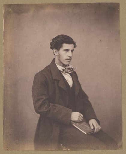 Portrait of an Unknown Seated Young Man with a Plaid Bow Tie, Holding a Book