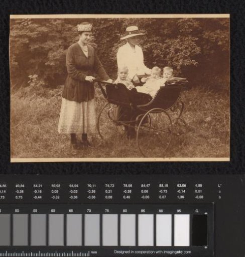 Petronella Bon and Neeltje Scheffer with a pram containing Daan Scheffer, Mimi, and Bertha