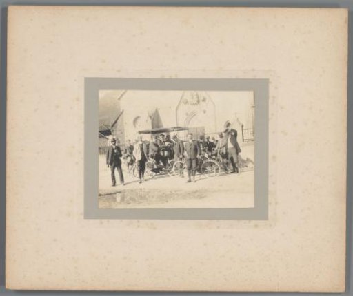 Group portrait of unknown cyclists and motorists near Bolzano