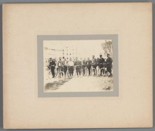 Group portrait of unknown cyclists upon arrival in Trento