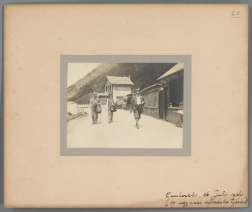 Three men walking near the confectionery factory in Cauterets