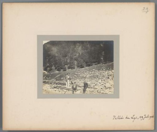 Three men on a bridge in the Vallée du Lys