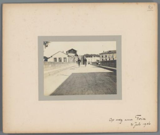 Two cyclists on a bridge near Foix