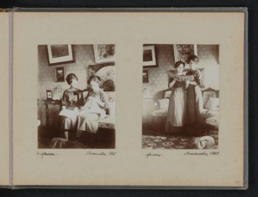 Two women embroidering and two women browsing a photo album