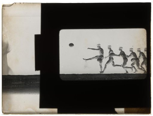 Man kicking the ball far ahead of him