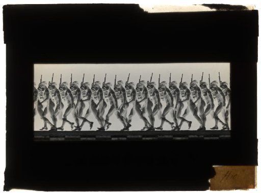 Man Walking with a Rifle