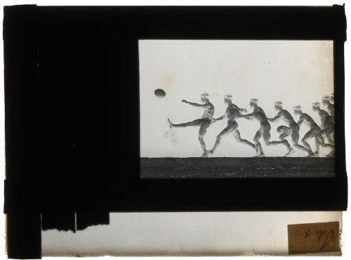 Man Kicking a Ball Upwards