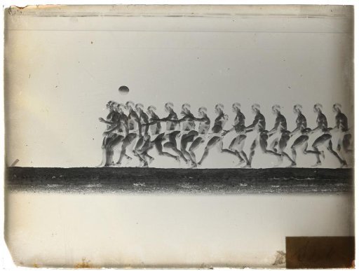 Man holding the ball in his hand and heading it away