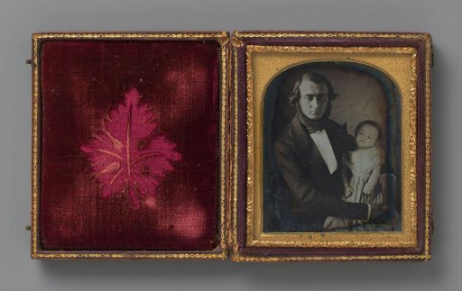 Portrait of a man with (probably) a deceased child