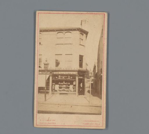 Advertisement for George Cheverton with view of his homeopathic pharmacy in Tunbridge Wells, England