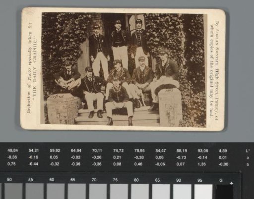 Group portrait of students at Oxford on a staircase