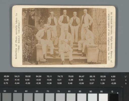 Group portrait of students at Cambridge on a staircase