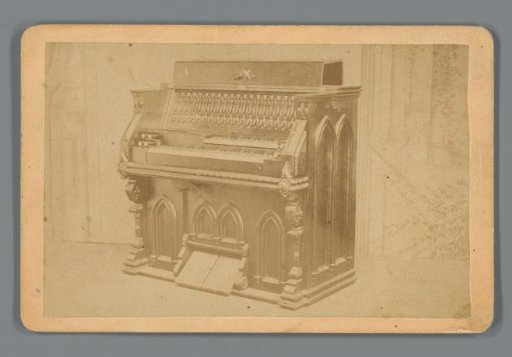 Advertisement with an organ, produced by The Cabinet Pipe Organ Company