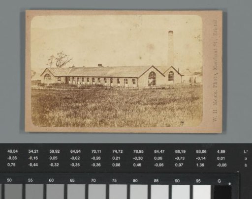 Advertisement for Clifton Steam Laundry Company with a view of a factory or warehouse